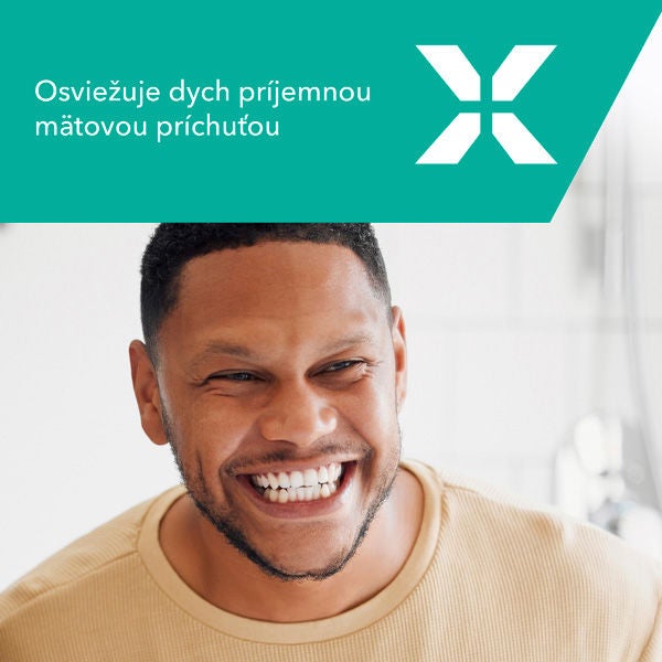 Logo značky Elmex s emblémom zemegule a rukou, odkazujúci na zodpovednú výrobu.