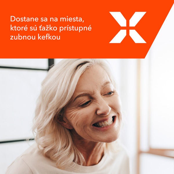 Logo zubnej pasty Elmex s formulou obsahujúcou fluorid a vápnik.